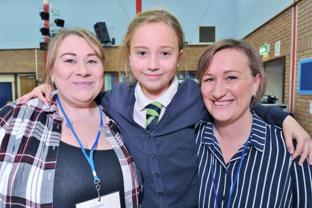 Ruby Pollard (9)  who rang 999 for her sick aunt pictured at Parnwell primary school with aunt Hannah Orbell and mum Kelly Granger EMN-171115-142855009