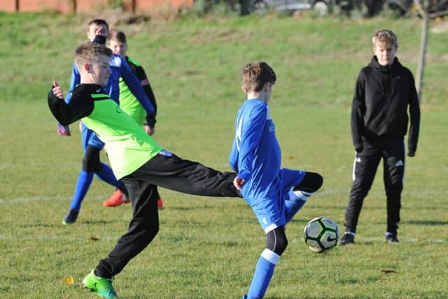 Action from Hampton Royals Under 14s v Malborne Under 14s.