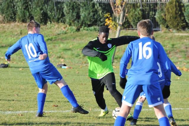 Action from Hampton Royals Under 14s v Malborne Under 14s.