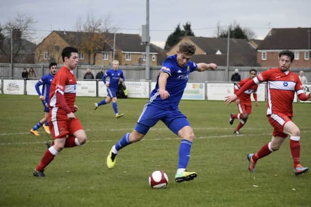 Peterborough Sports striker Mark Jones shoots at goal during the 3-2 home defeat at the hands of Chasetown. Photo: James Richardson.