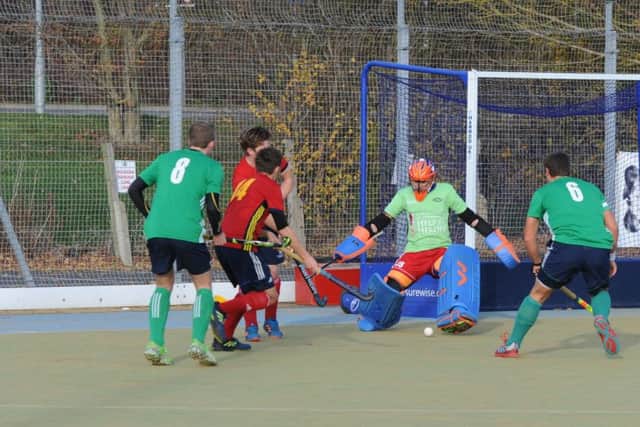 City of Peterborough (red) on the attack in their 10-2 win over Chelmsford at Bretton Gate. Photo: David Lowndes.