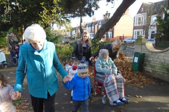 Children and residents on a walk in Peterborough