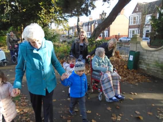 Children and residents on a walk in Peterborough