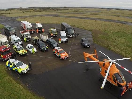 Vehicles assemble at the start of the road safety campaign