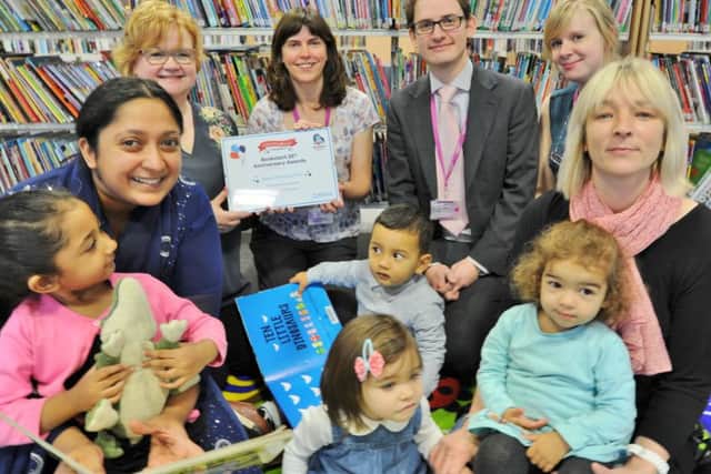 Central library staffand award winners Kay Devine, Richard Hunt, Elaine Wilkinson and Rebecca Campling with parents and children at an under 5's book session. EMN-171121-154559009
