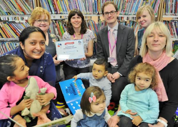 Central library staffand award winners  Kay Devine, Richard Hunt, Elaine Wilkinson and Rebecca Campling with parents and children at an under 5's book  session. EMN-171121-154559009